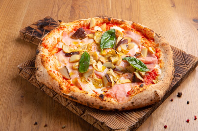 Truffle mushroom gourmet pizza with fontina cheese