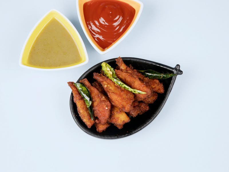 Crispy chicken wings with buffalo sauce