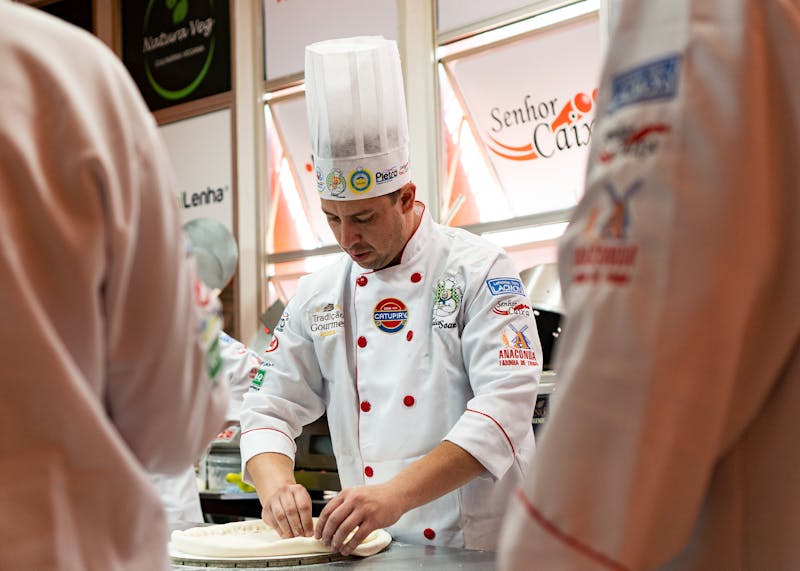 Apache Pizza chef crafting handmade pizza in Dublin kitchen