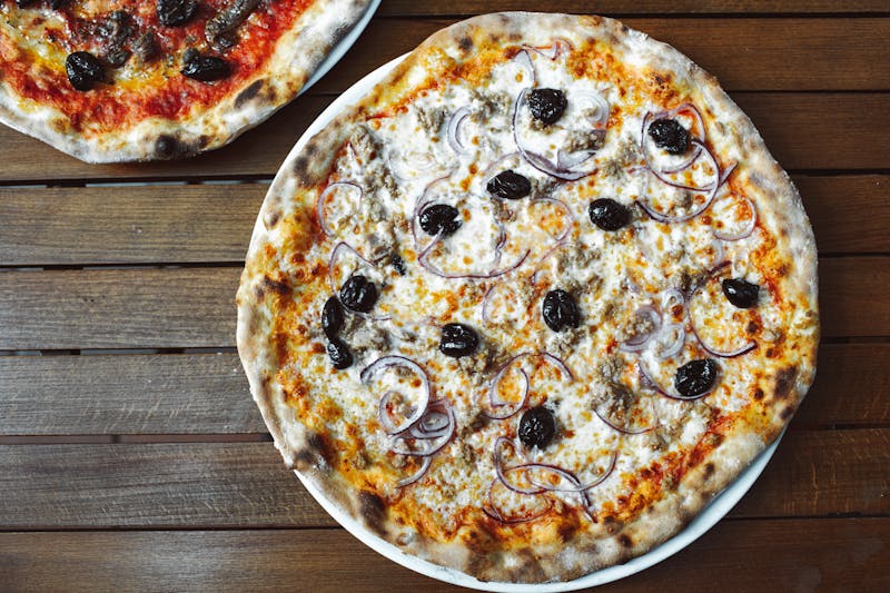 BBQ chicken pizza with caramelized onions
